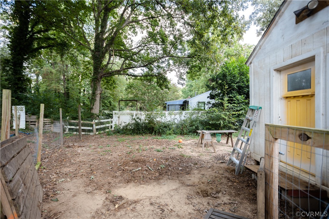 3160 Mountclair Road Chester, VA 23831 - Photo 44 of 50 a view of a backyard with plants and large trees