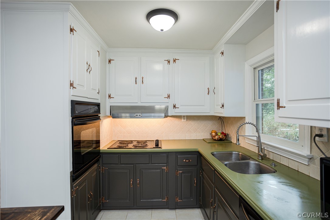 3160 Mountclair Road Chester, VA 23831 - Photo 7 of 50 a kitchen with granite countertop a sink and cabinets