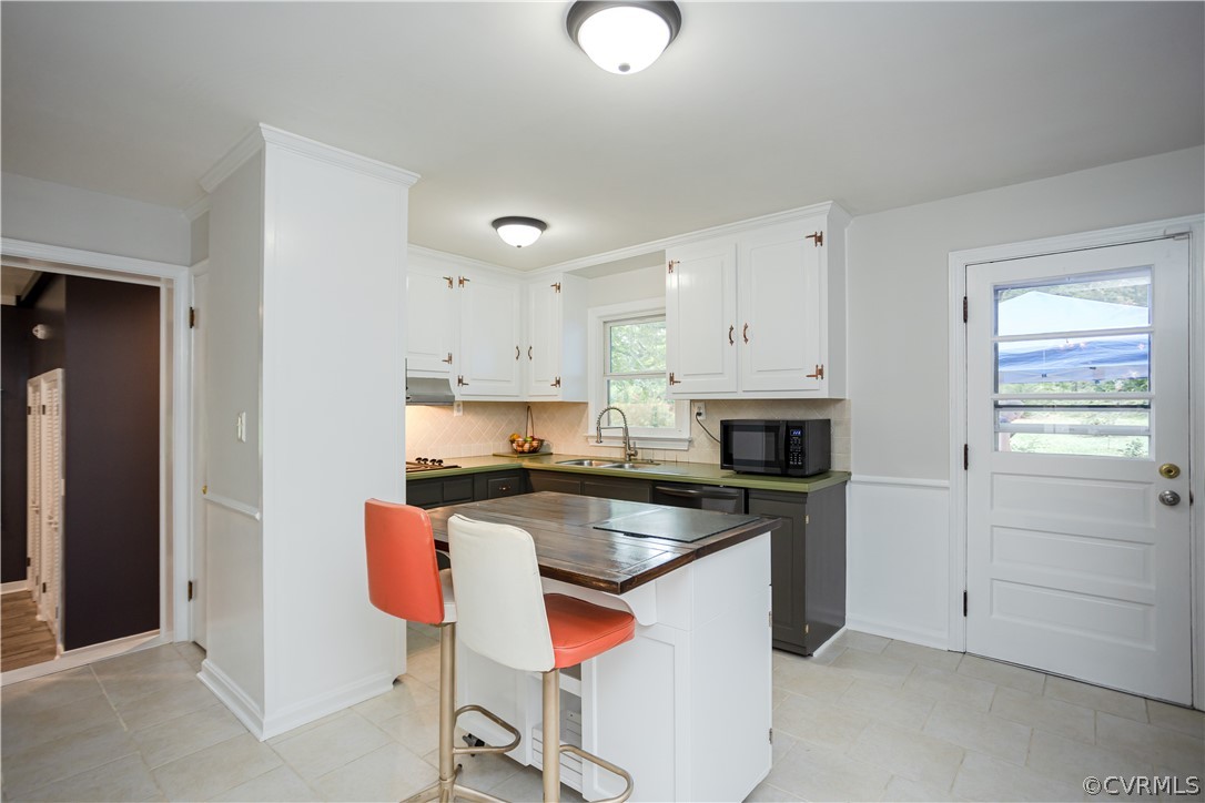 3160 Mountclair Road Chester, VA 23831 - Photo 9 of 50 a kitchen with cabinets appliances and a window