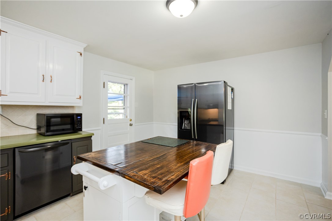 3160 Mountclair Road Chester, VA 23831 - Photo 10 of 50 a kitchen with a stove a refrigerator and microwave