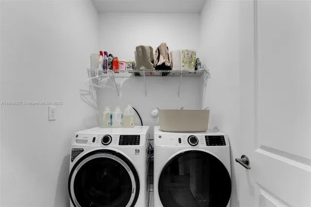 a utility room with dryer and washer