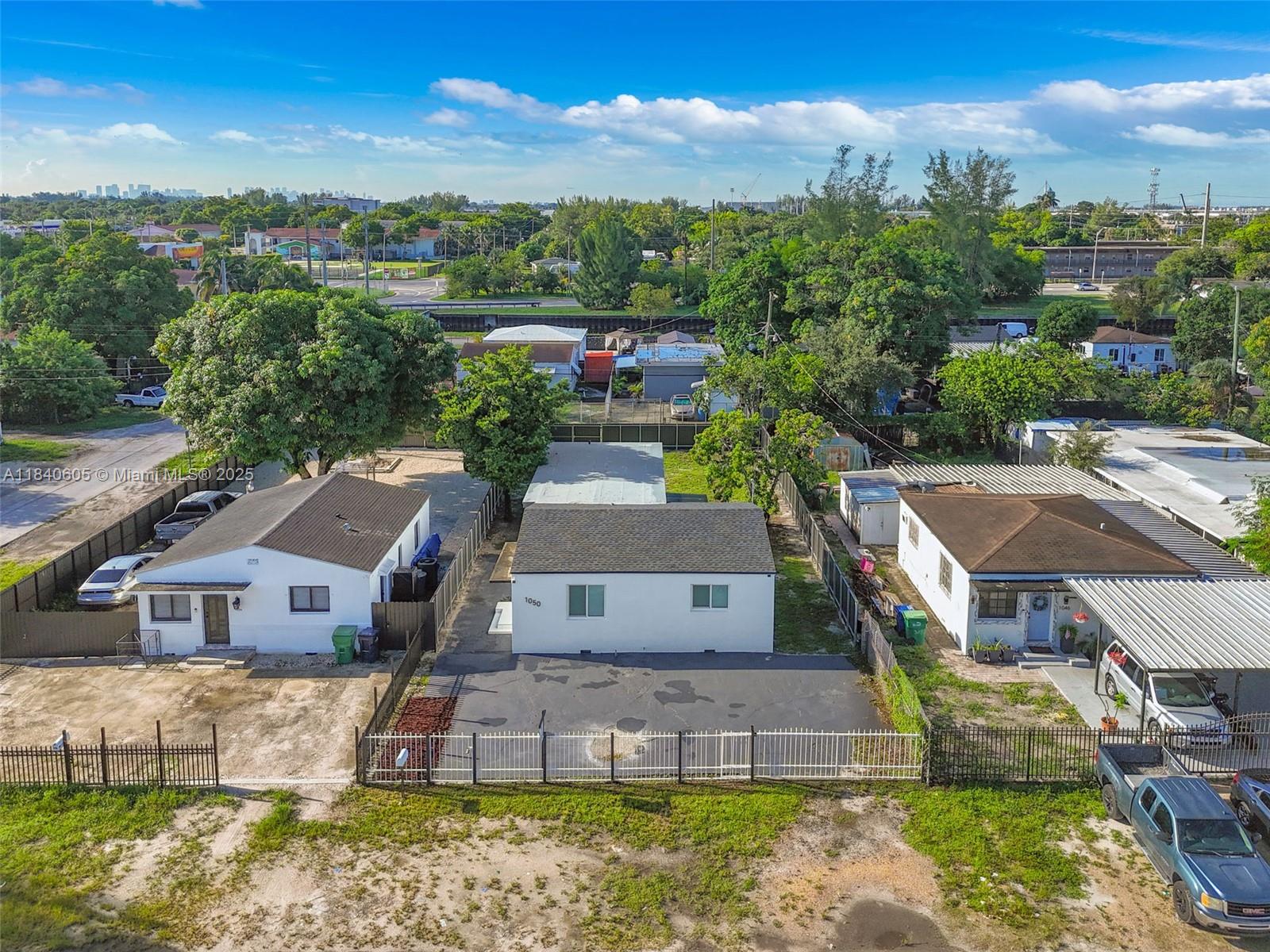 1050 Superior Street Opa-Locka, FL 33054 - Photo 19 of 20 an aerial view of a house with a yard