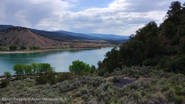 500 County Road 252 Rifle, CO 81650 - Photo 2 of 3 a view of a lake with a mountain in the background