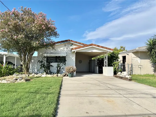 a view of a house with a patio