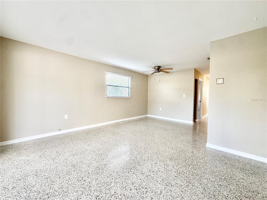 4335 Floramar Terrace New Port Richey, FL 34652 - Photo 18 of 30 an empty room with a empty space and windows