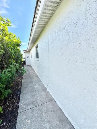 a backyard of a house with lots of green space