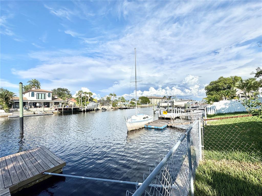 4335 Floramar Terrace New Port Richey, FL 34652 - Photo 30 of 30 a view of a lake from a yard