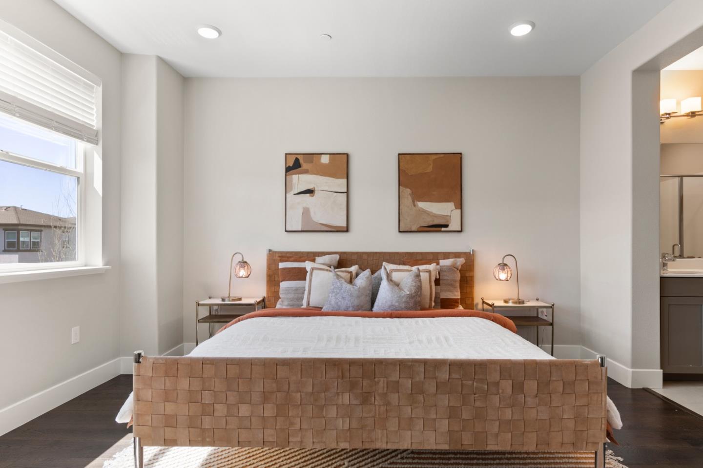 875 Cotati Terrace, Unit 3 Sunnyvale, CA 94085 - Photo 14 of 36 a bedroom with a bed and wooden floor