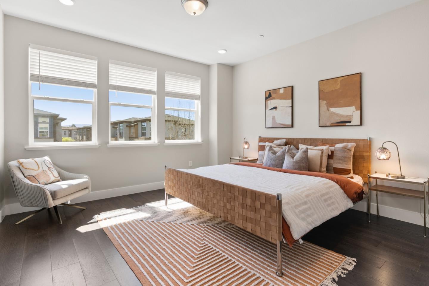 875 Cotati Terrace, Unit 3 Sunnyvale, CA 94085 - Photo 15 of 36 a bedroom with a bed and wooden floor