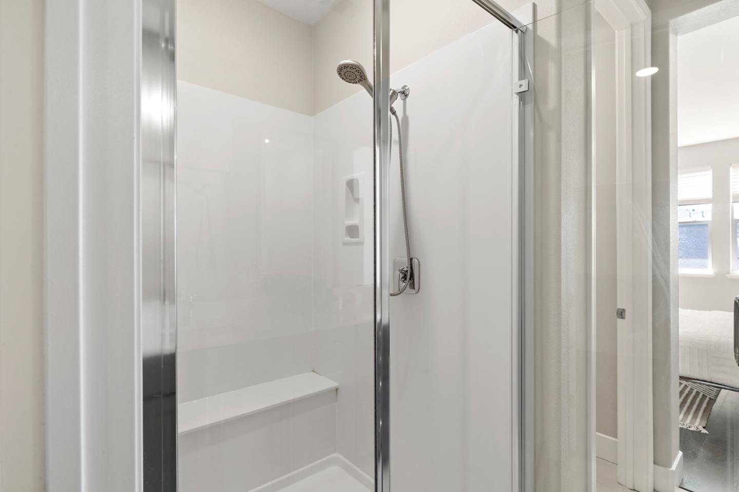 875 Cotati Terrace, Unit 3 Sunnyvale, CA 94085 - Photo 18 of 36 a bathroom with a glass shower door