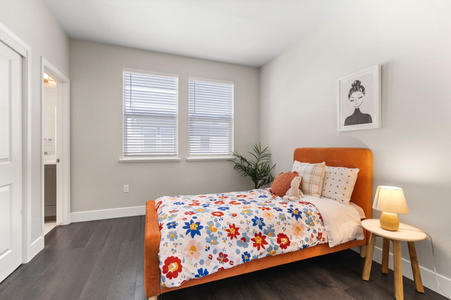 875 Cotati Terrace, Unit 3 Sunnyvale, CA 94085 - Photo 20 of 36 a bedroom with a bed and wooden floor