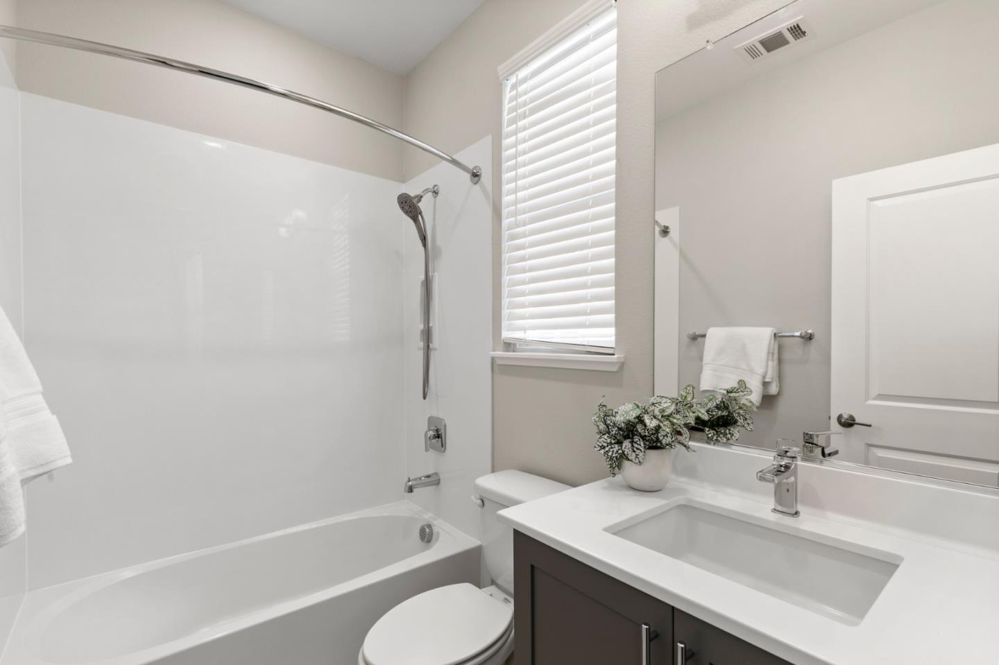875 Cotati Terrace, Unit 3 Sunnyvale, CA 94085 - Photo 22 of 36 a bathroom with a sink toilet and shower
