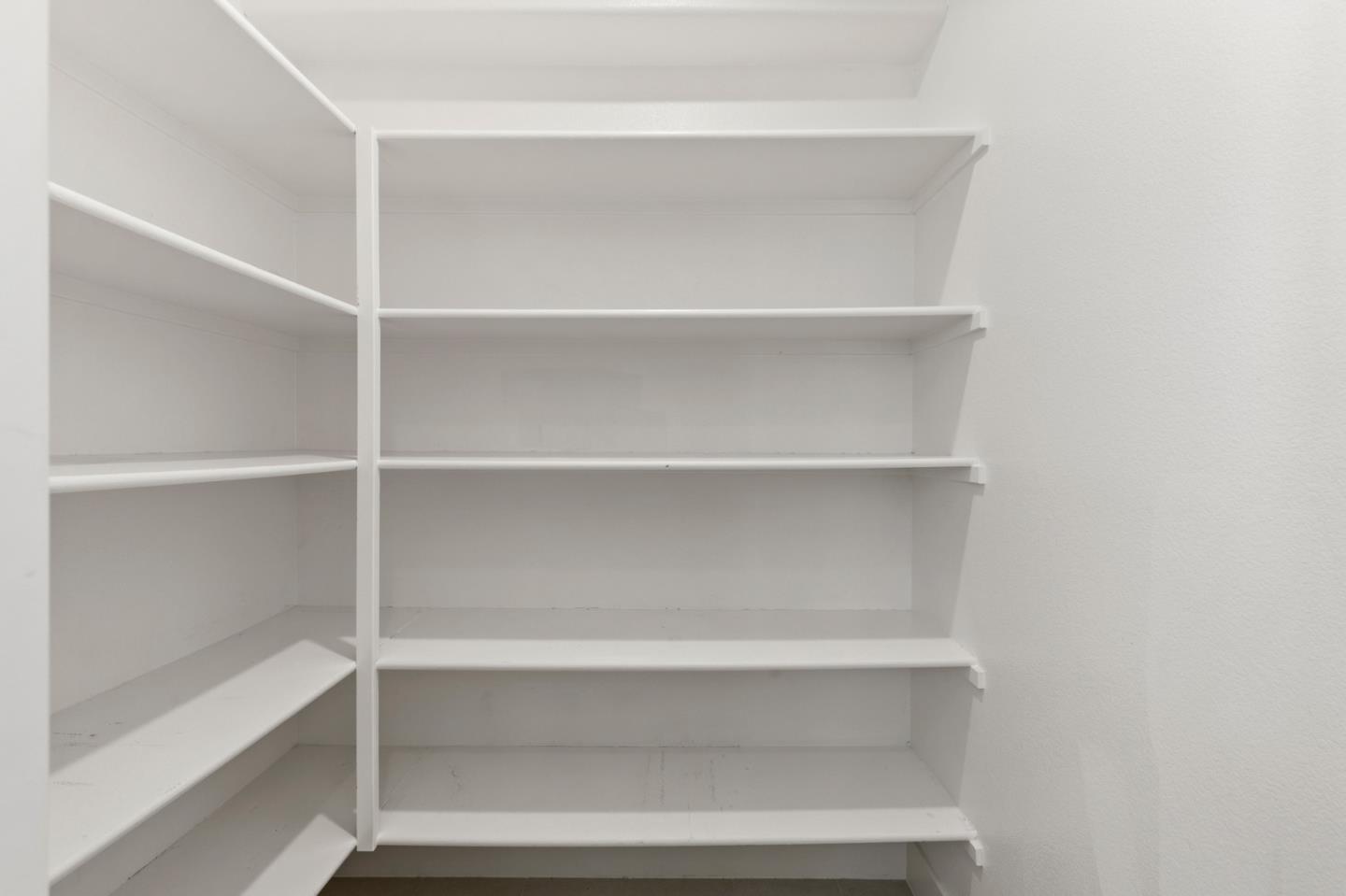 875 Cotati Terrace, Unit 3 Sunnyvale, CA 94085 - Photo 23 of 36 a view of walk in closet with empty racks