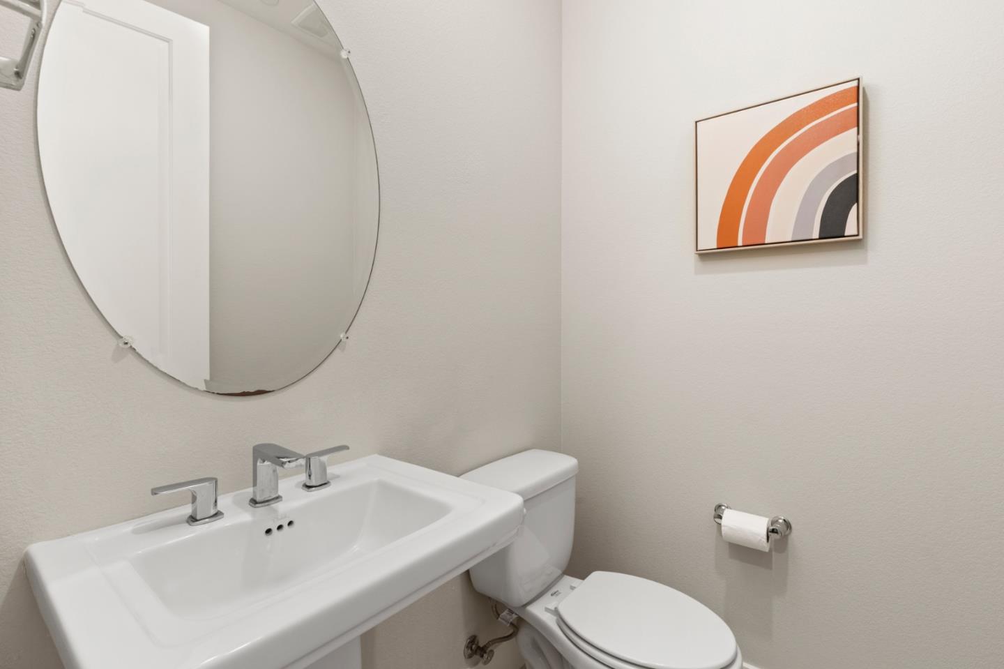 875 Cotati Terrace, Unit 3 Sunnyvale, CA 94085 - Photo 24 of 36 a bathroom with a toilet a sink and mirror