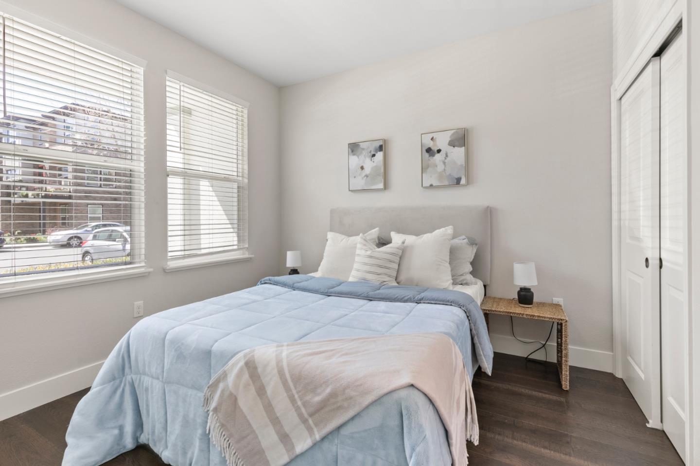 875 Cotati Terrace, Unit 3 Sunnyvale, CA 94085 - Photo 26 of 36 a bedroom with a bed and a large window