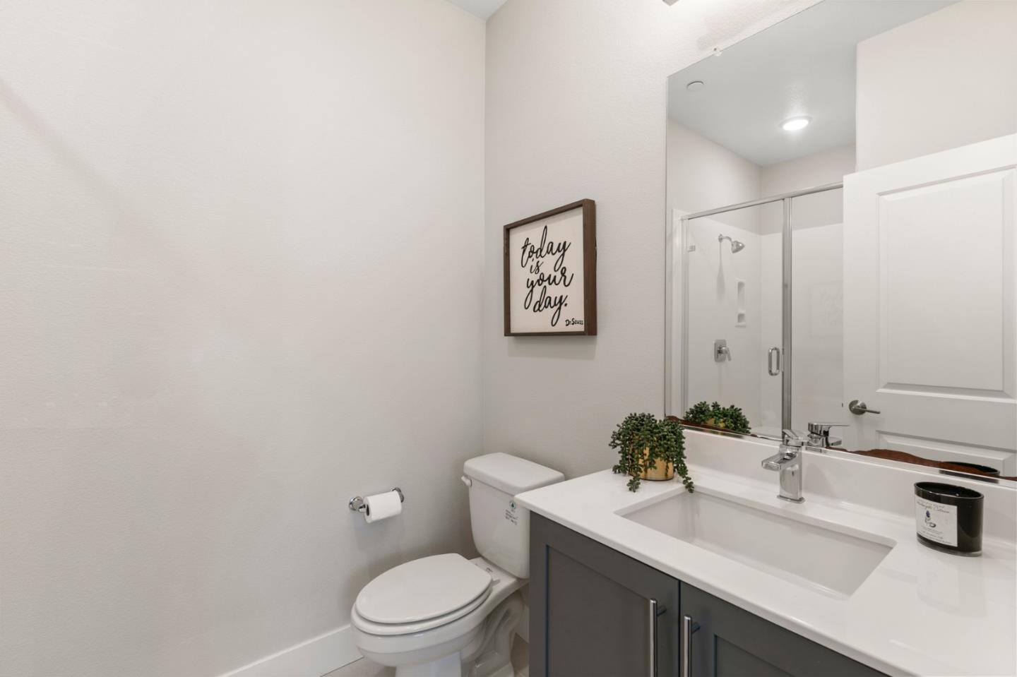875 Cotati Terrace, Unit 3 Sunnyvale, CA 94085 - Photo 28 of 36 a bathroom with a toilet sink and mirror