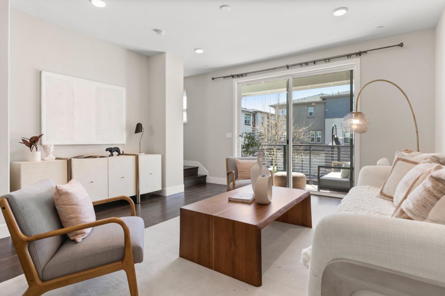 875 Cotati Terrace, Unit 3 Sunnyvale, CA 94085 - Photo 3 of 36 a living room with furniture and a floor to ceiling window