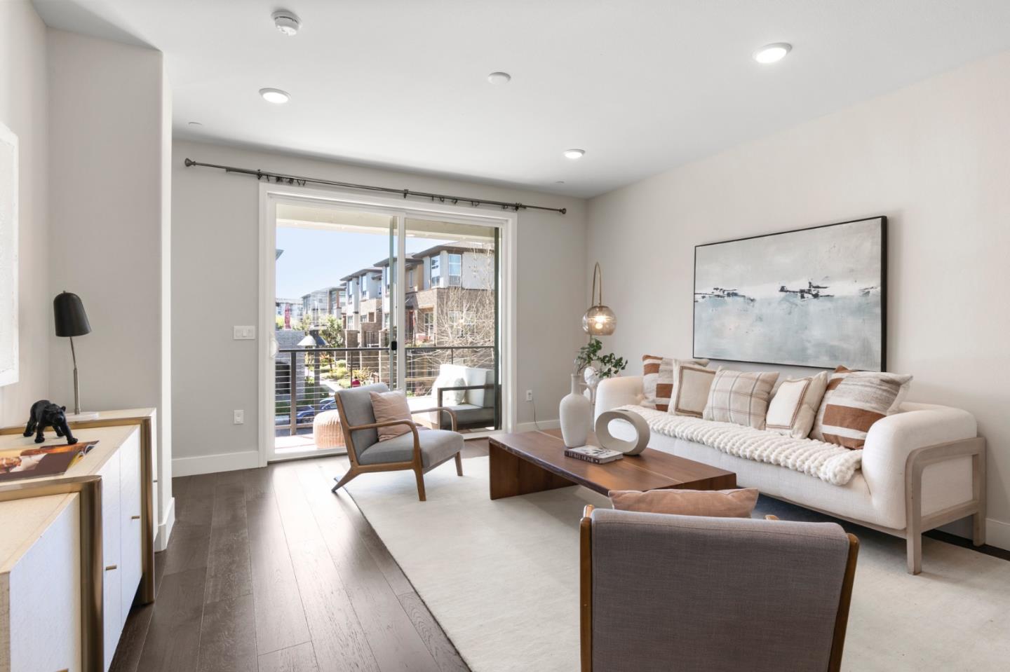 875 Cotati Terrace, Unit 3 Sunnyvale, CA 94085 - Photo 4 of 36 a living room with furniture and a large window