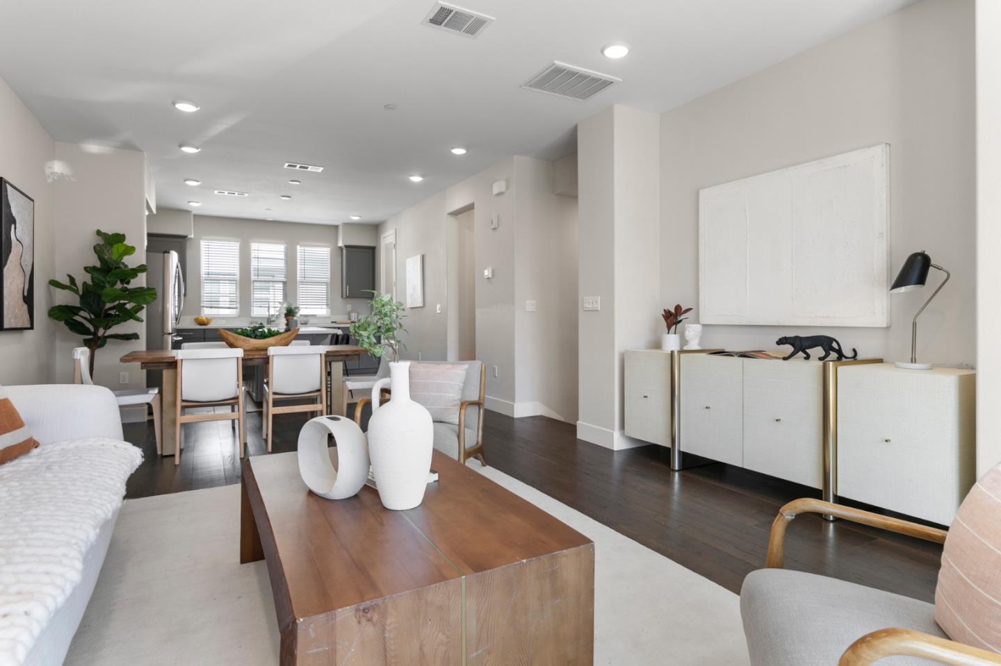 875 Cotati Terrace, Unit 3 Sunnyvale, CA 94085 - Photo 5 of 36 a view of a dining room with furniture and wooden floor