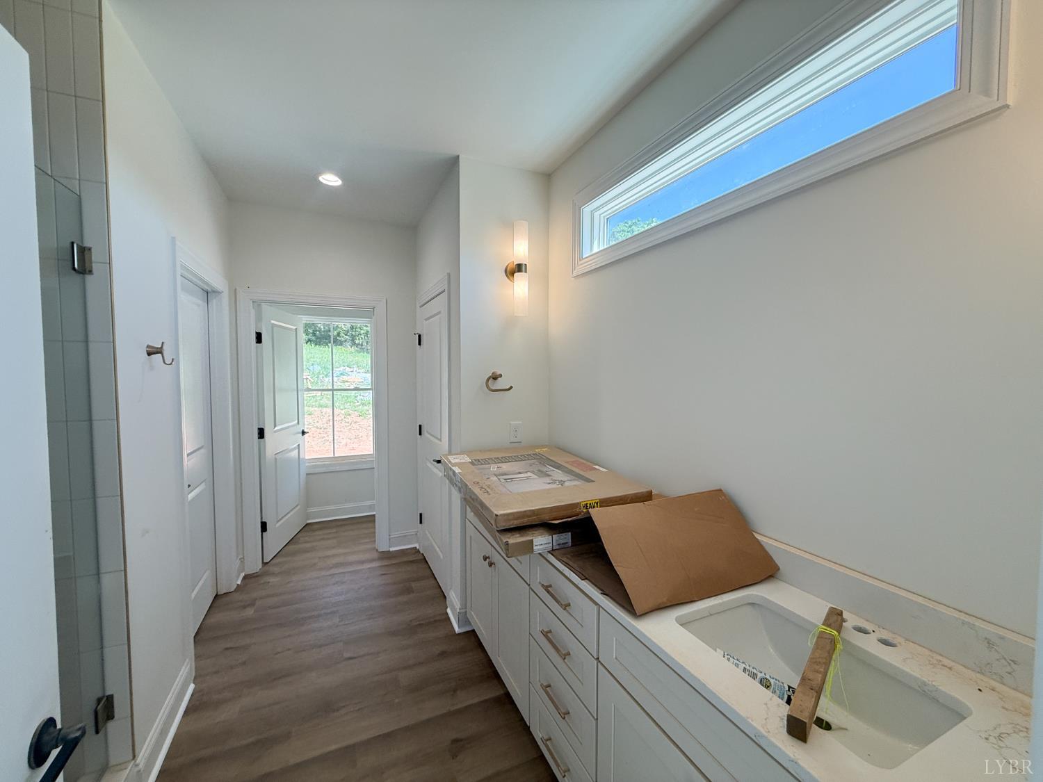 9009 Stonewall Road Appomattox, VA 24522 - Photo 21 of 38 a room with a bed and wooden floor
