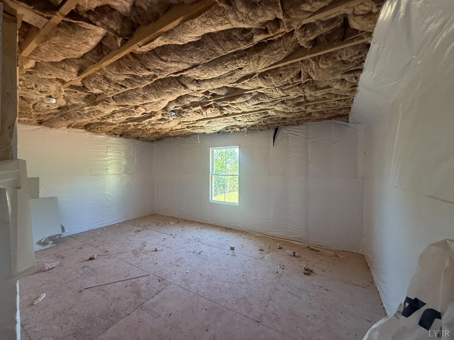 9009 Stonewall Road Appomattox, VA 24522 - Photo 27 of 38 a view of a room with a wooden floor and window