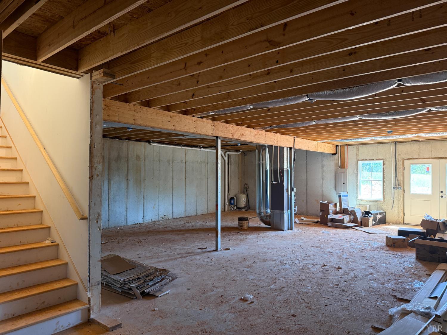 9009 Stonewall Road Appomattox, VA 24522 - Photo 29 of 38 a view of a livingroom with furniture and staircase