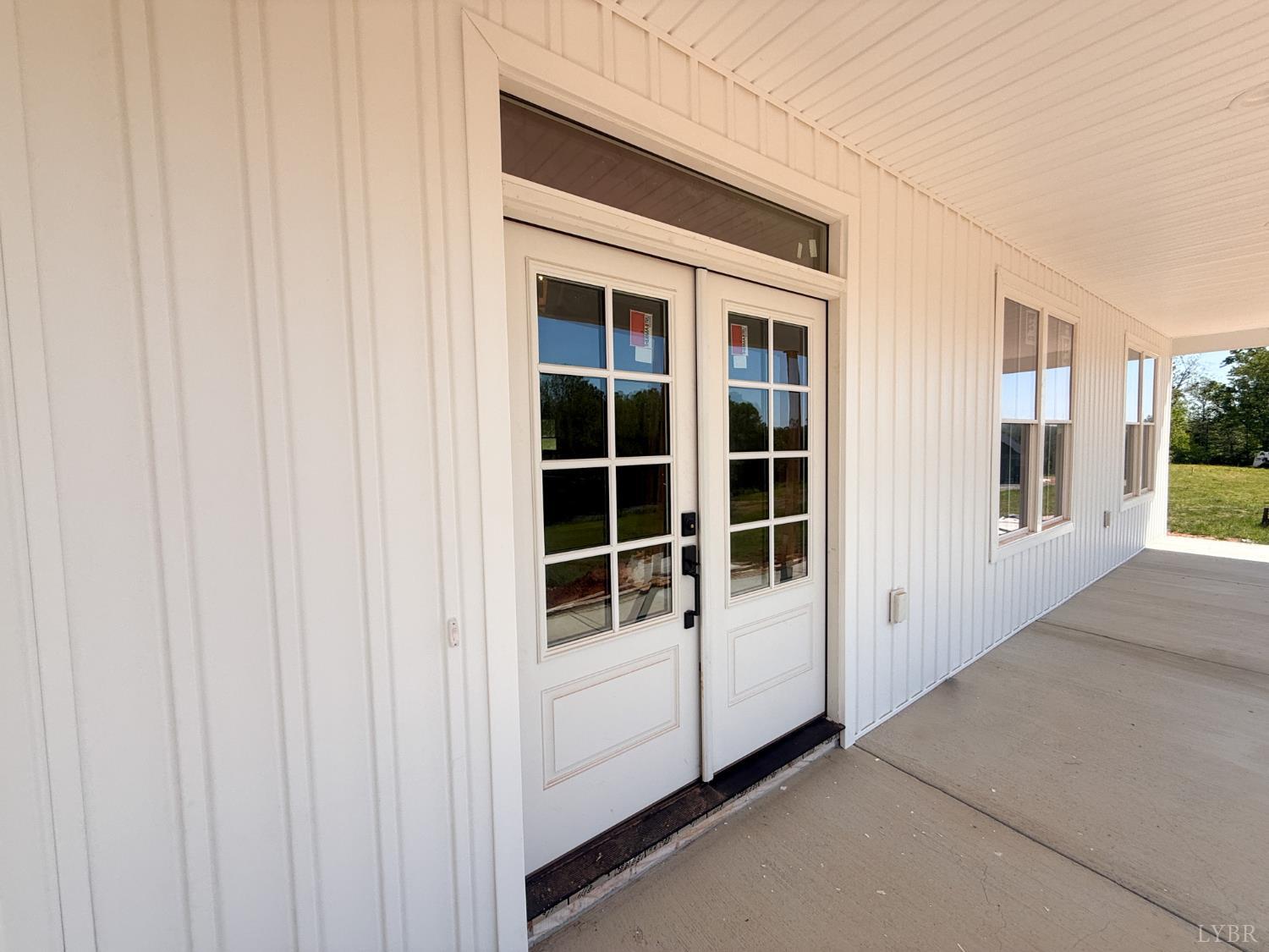 9009 Stonewall Road Appomattox, VA 24522 - Photo 3 of 38 a view of front door and deck