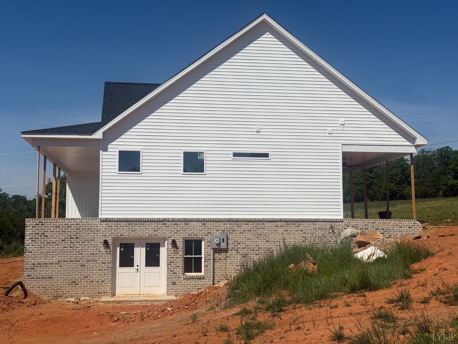 9009 Stonewall Road Appomattox, VA 24522 - Photo 32 of 38 a view of a house with backyard