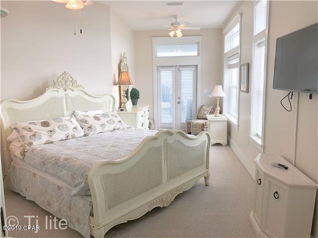 21605 Front Beach Road Panama City Beach, FL 32413 - Photo 14 of 17 a large white bed in a white room