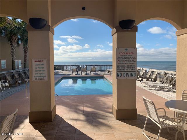 21605 Front Beach Road Panama City Beach, FL 32413 - Photo 15 of 17 a view of a living room and dining room