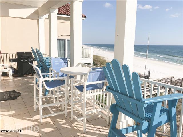 21605 Front Beach Road Panama City Beach, FL 32413 - Photo 3 of 17 a view of an outdoor dining space with furniture