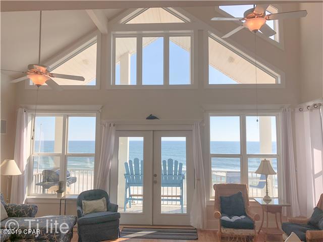 21605 Front Beach Road Panama City Beach, FL 32413 - Photo 5 of 17 a living room with furniture and a floor to ceiling window