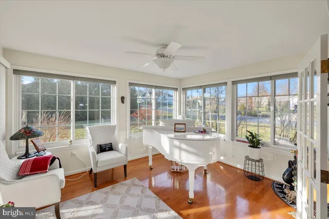 a bathroom with a sink mirror and vanity