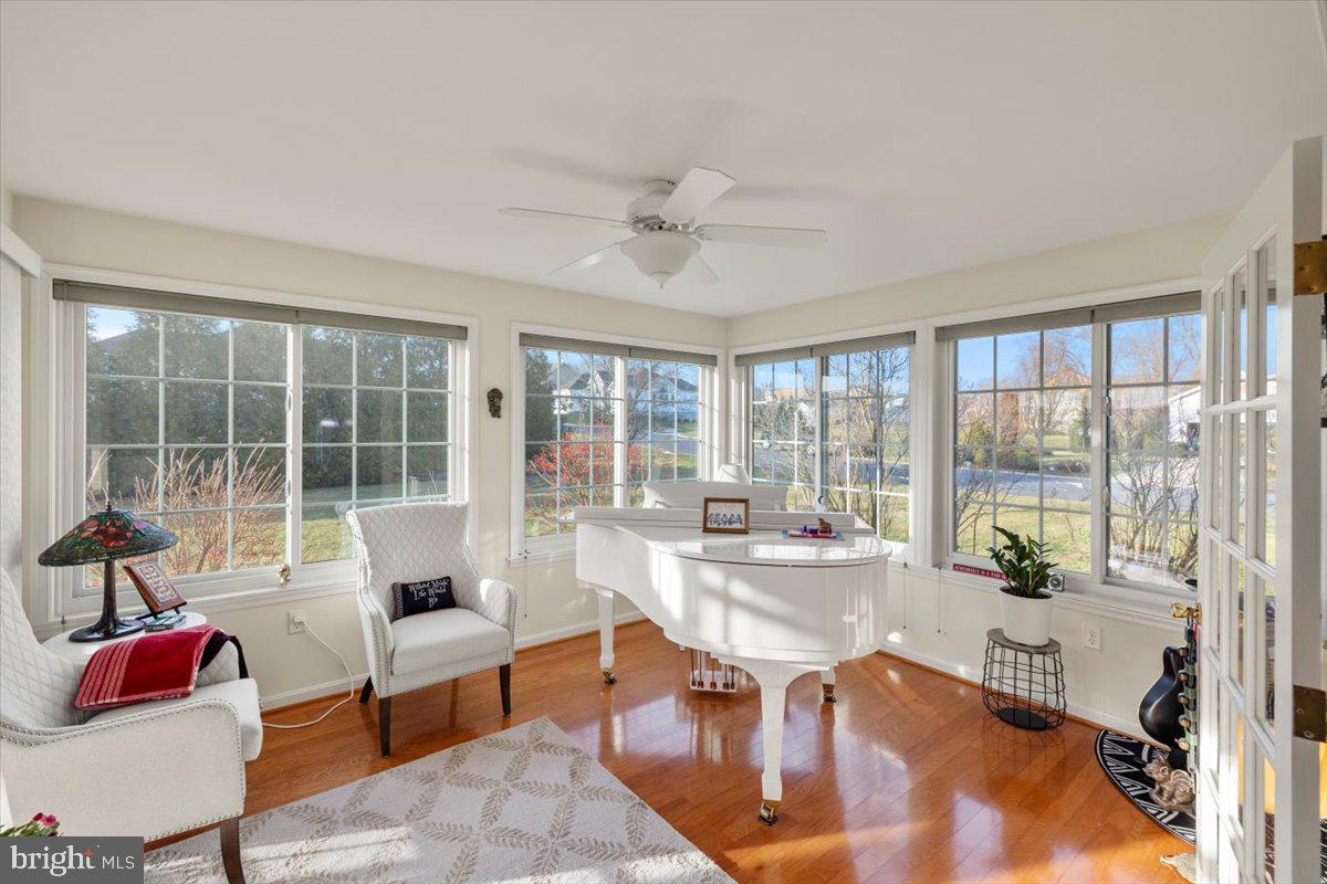 334 Friendship Lane Gettysburg, PA 17325 - Photo 29 of 64 a living room with furniture and a floor to ceiling window
