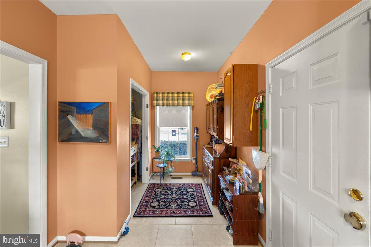 334 Friendship Lane Gettysburg, PA 17325 - Photo 33 of 64 a view of a hallway to a livingroom with furniture and a window