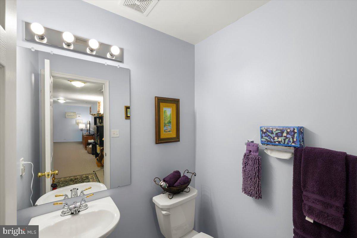 334 Friendship Lane Gettysburg, PA 17325 - Photo 42 of 64 a bathroom with a toilet sink and mirror