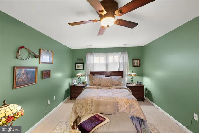 an aerial view of a house with a swimming pool yard and outdoor seating