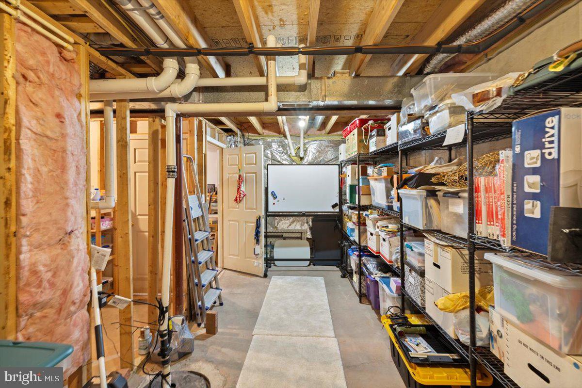 334 Friendship Lane Gettysburg, PA 17325 - Photo 57 of 64 a view of an empty room with wooden floor