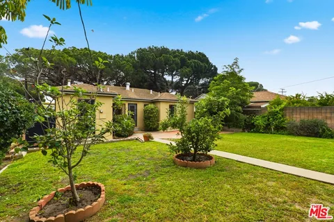 a house view with a garden space