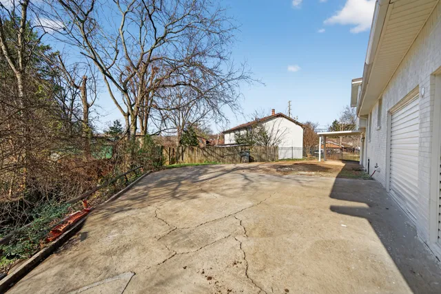 a view of house with yard