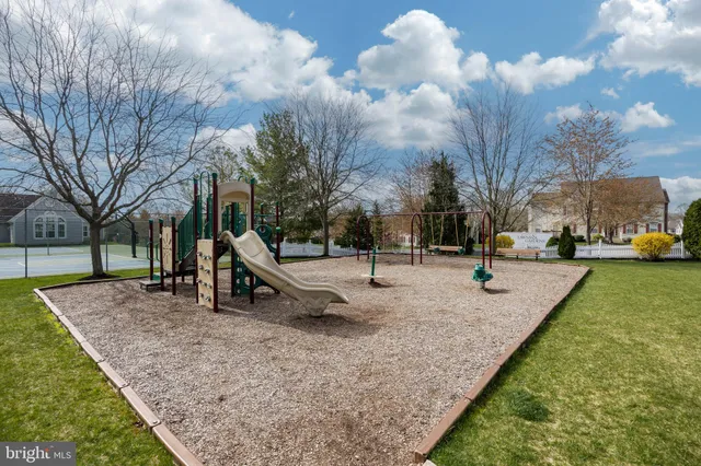a view of a park with swings