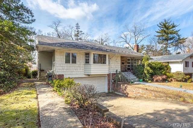 6 Norfolk Road Great Neck, NY 11020 - Photo 1 of 1 a view of a house with a patio