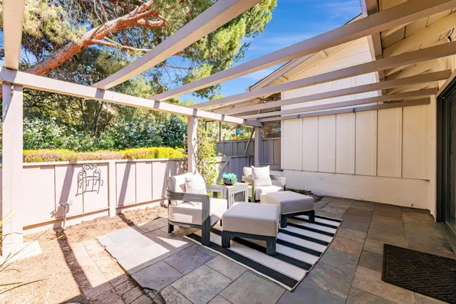 a building outdoor space with patio furniture