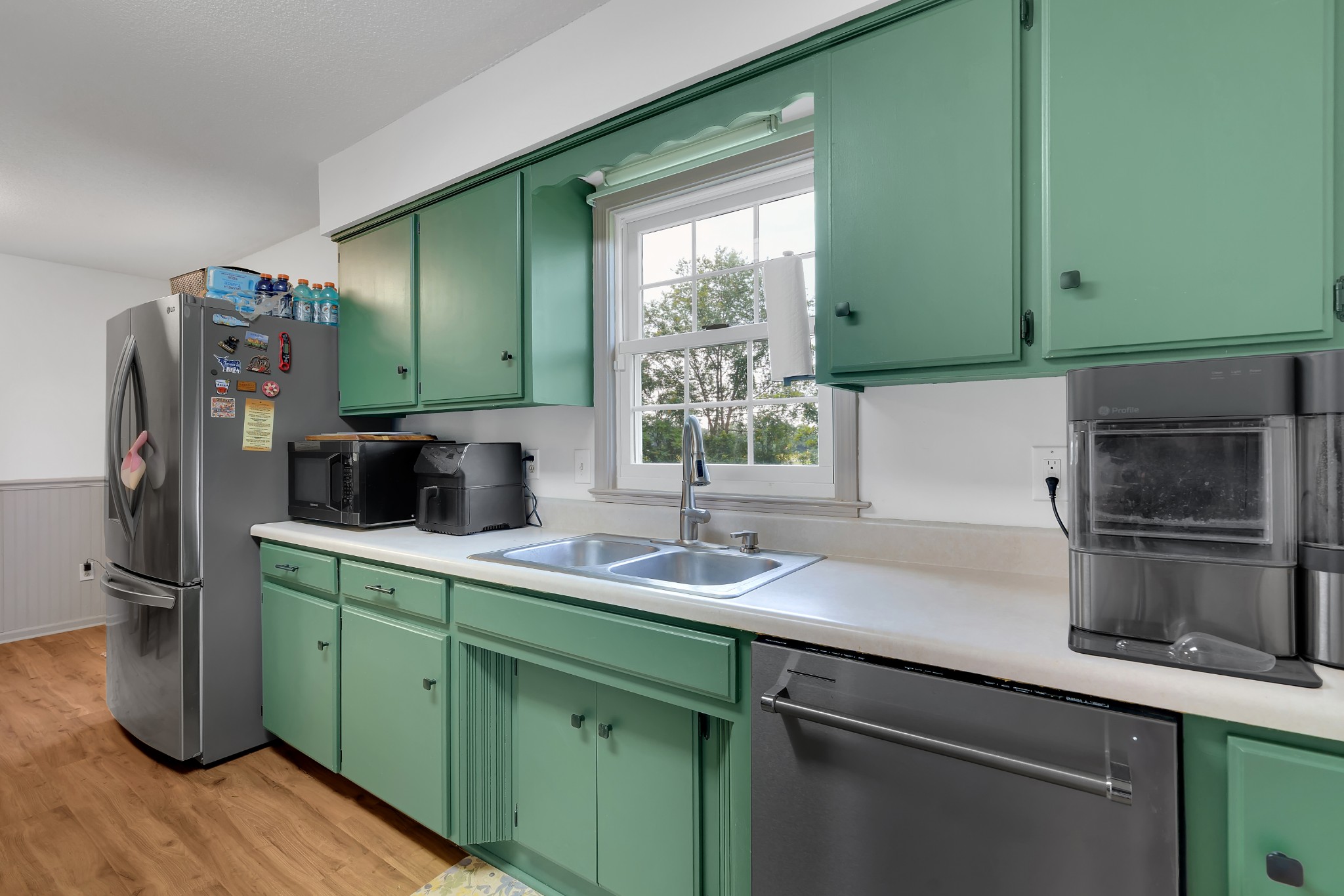 5363 Candy Cane Court Murfreesboro, TN 37129 - Photo 11 of 34 a kitchen with a sink cabinets and stainless steel appliances