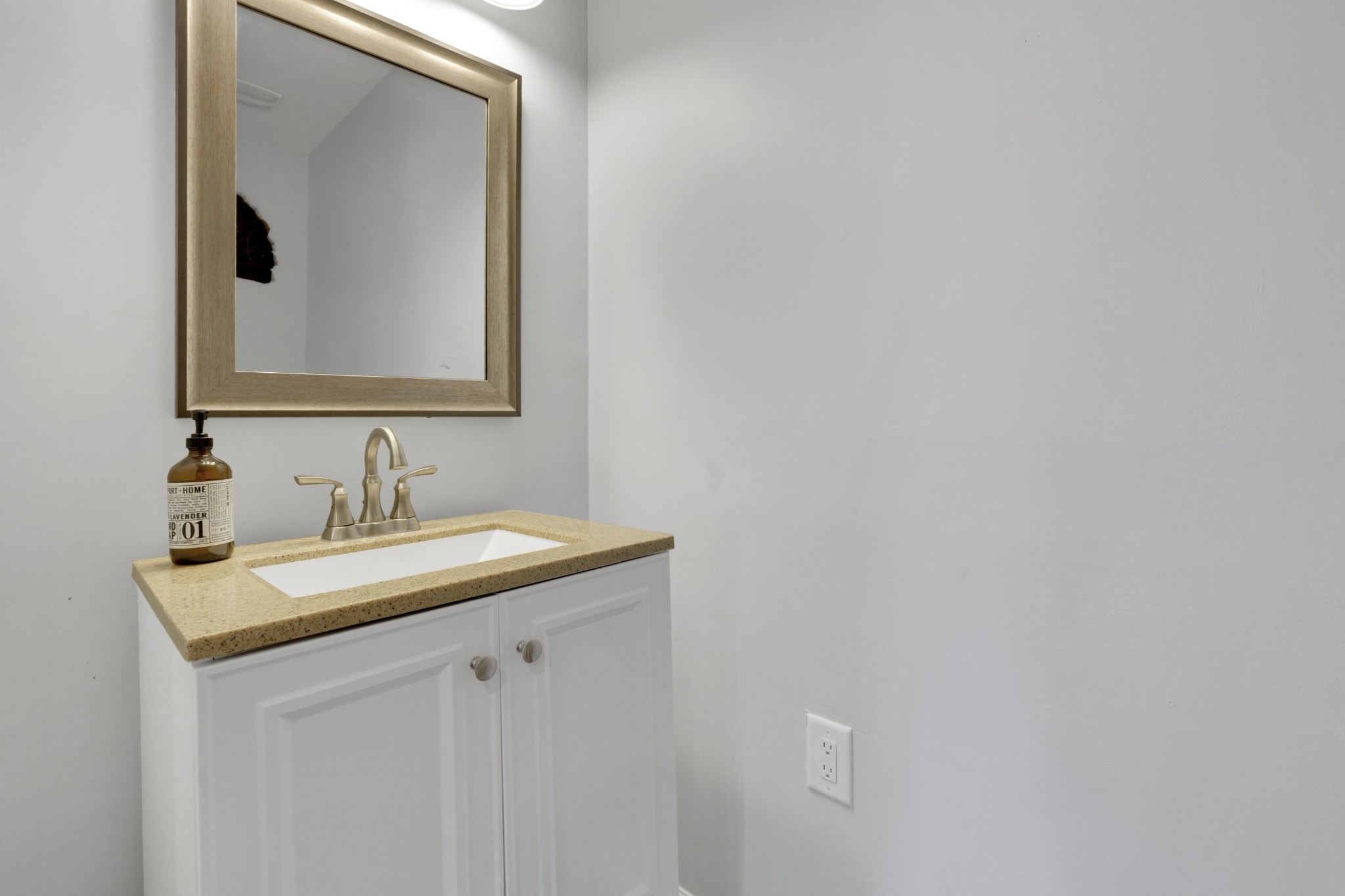 5363 Candy Cane Court Murfreesboro, TN 37129 - Photo 20 of 34 a bathroom with a sink and a mirror