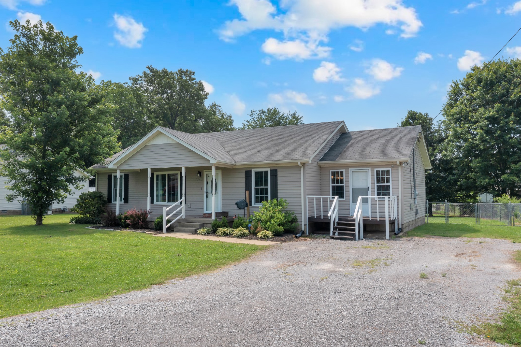5363 Candy Cane Court Murfreesboro, TN 37129 - Photo 2 of 34 a front view of a house with a yard