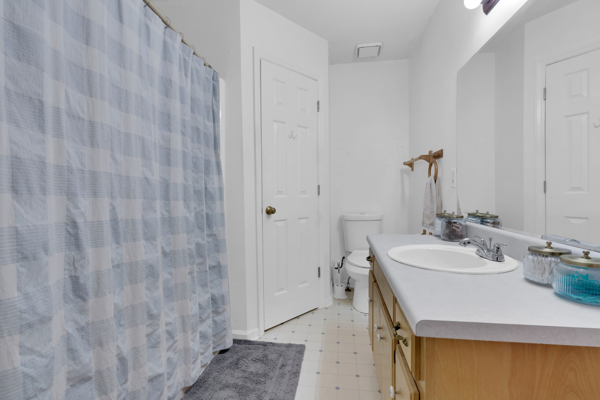 5363 Candy Cane Court Murfreesboro, TN 37129 - Photo 23 of 34 a bathroom with a sink and a mirror