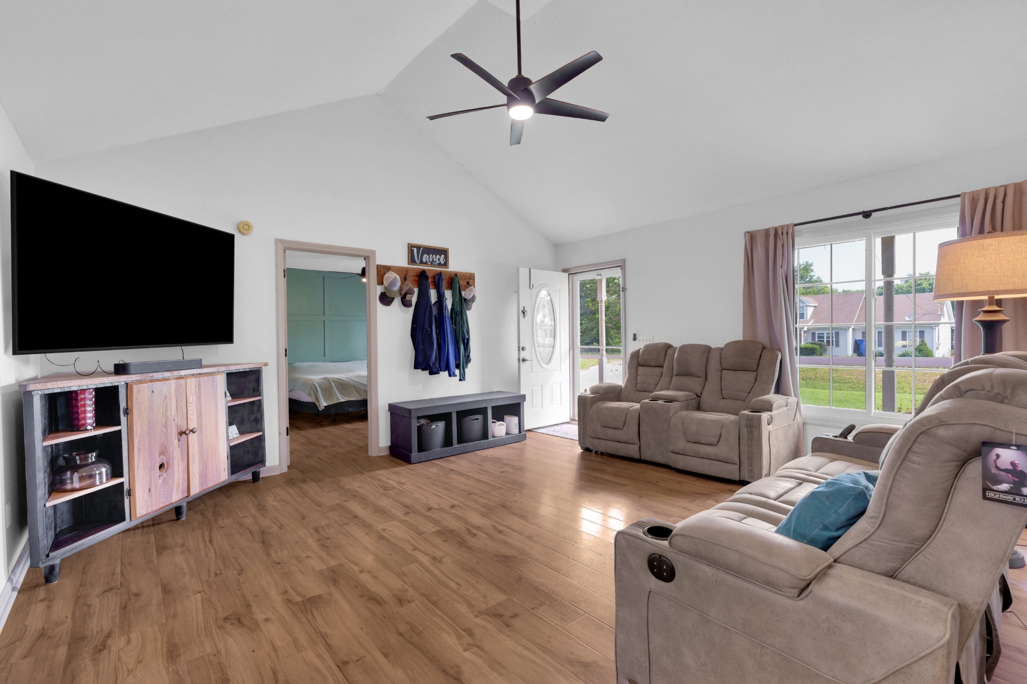 5363 Candy Cane Court Murfreesboro, TN 37129 - Photo 6 of 34 a living room with furniture and a flat screen tv