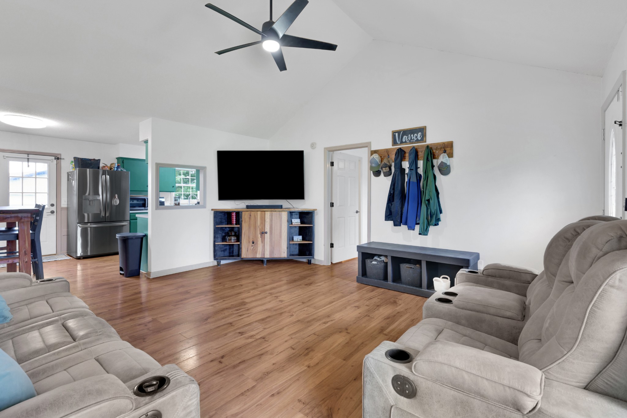 5363 Candy Cane Court Murfreesboro, TN 37129 - Photo 8 of 34 a living room with furniture and a flat screen tv