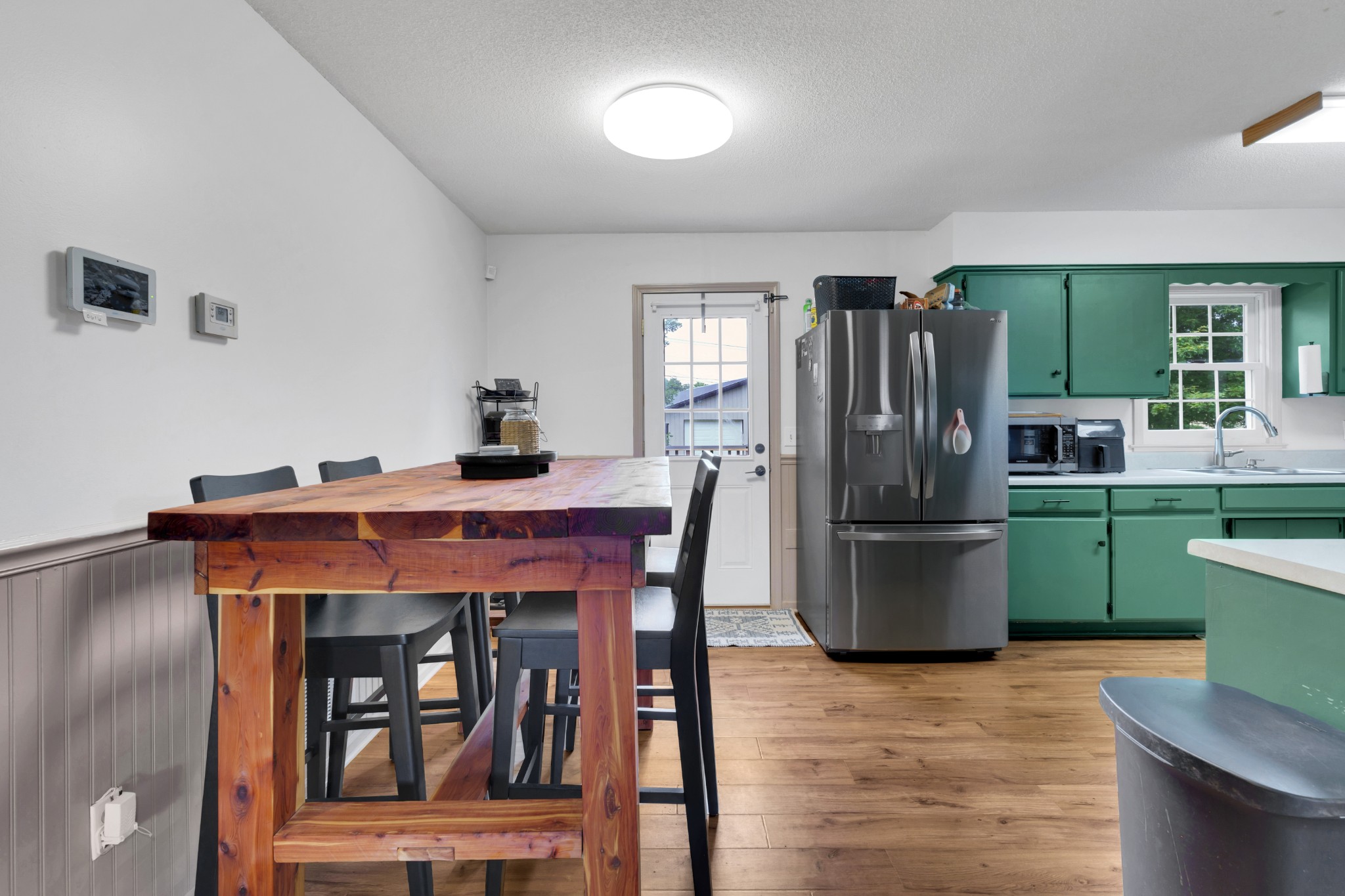 5363 Candy Cane Court Murfreesboro, TN 37129 - Photo 9 of 34 a kitchen with stainless steel appliances kitchen island a refrigerator and a sink
